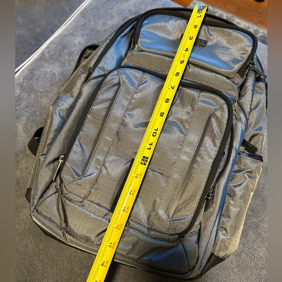 Metallic gray Samsonite backpack. - Picture 2 of 10